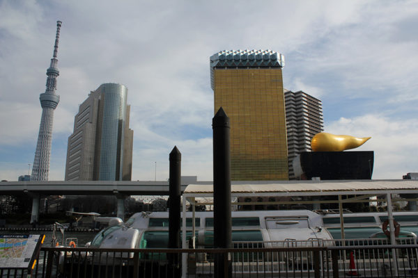 Tokyo Skytree and the Asahi buildings (intended to look like a beer glass and next to it the 'Asahi Flame', locally known as the golden turd.
